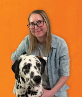 Headshot of Elizabeth Dimit with dog